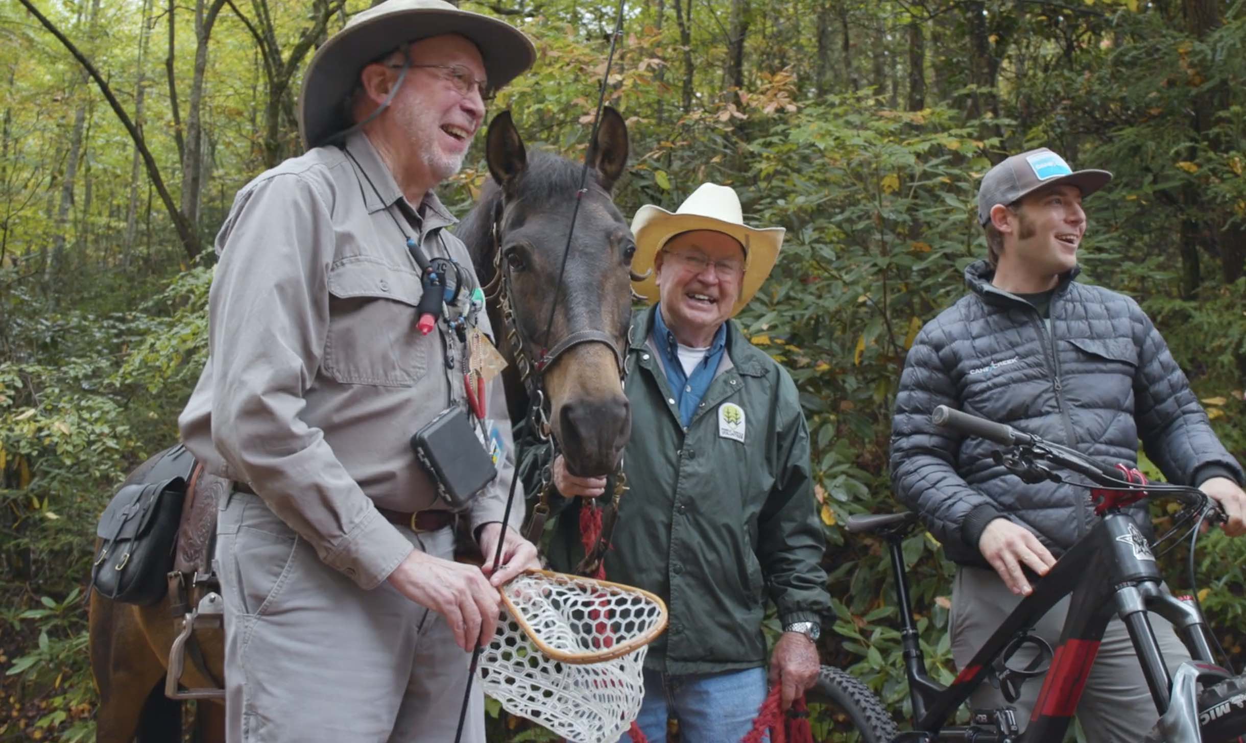 Fisherman horses and mountain bikers