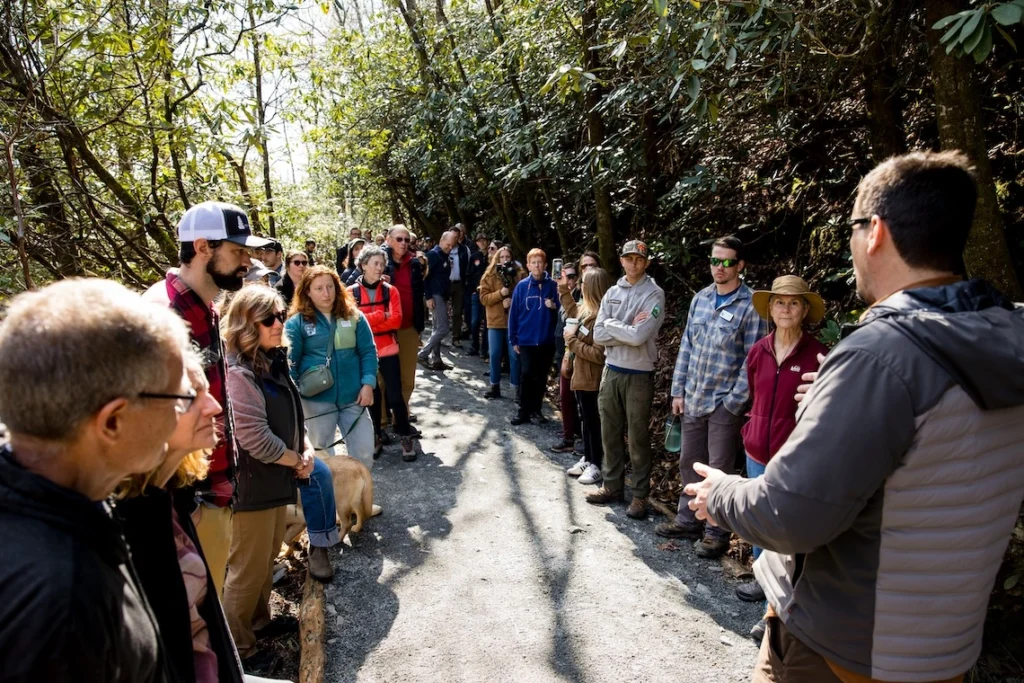 TPC's Trail Specialist, Jeff Maitz, addresses the crowd before the ribbon cutting on the Estatoe trail.