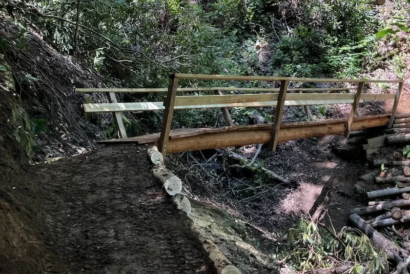 Photo showing the new trail bridge on North Slope trail
